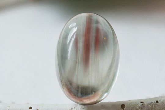 オレゴンサンストーンライトブルーブラウン6.99ctオーバルカボション