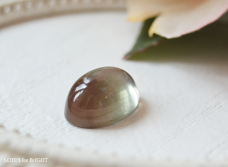 オレゴンサンストーンライトブルーブラウン6.99ctオーバルカボション