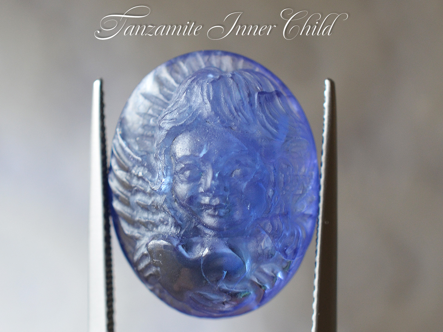 タンザナイトインナーチャイルドカービング 19.37ct