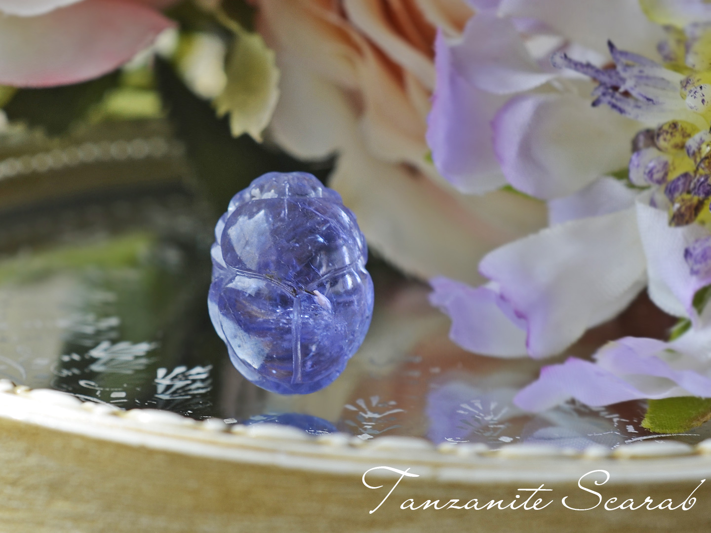 セレスチャルブルータンザナイトスカラベカービング21.97ct