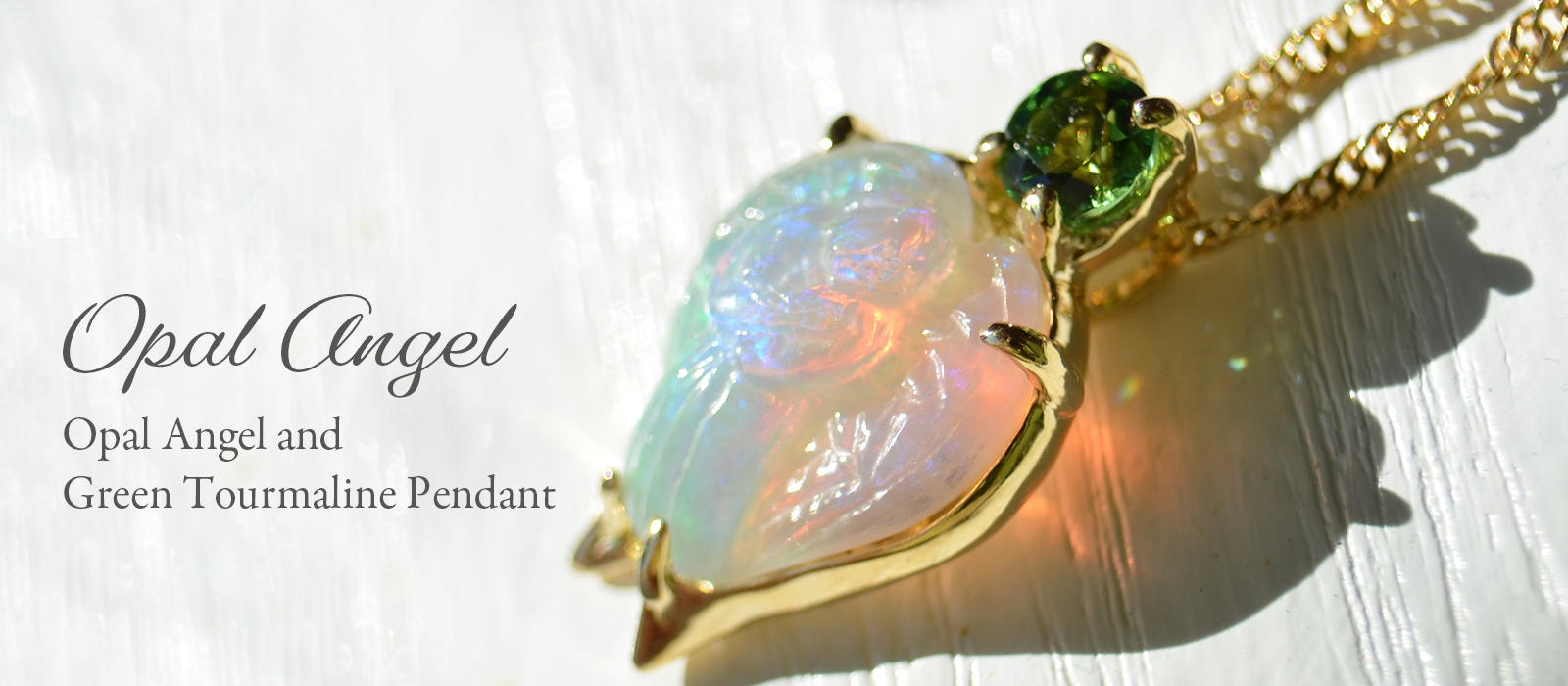 ミンタビ産オパールエンジェルカービングK18ゴールドペンダント