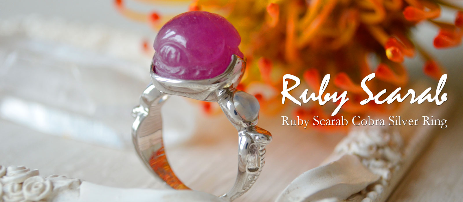 ルビースカラベ　レインボームーンストーンコブラリング